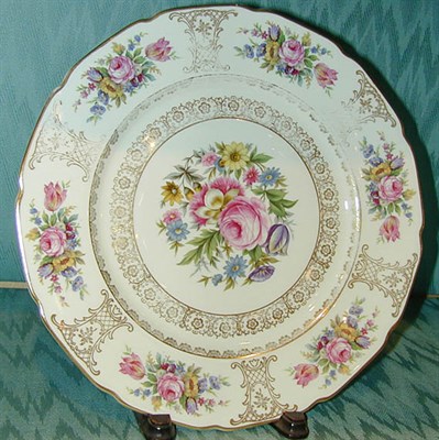 Lot 686 - Set of Eight Gilt and Floral Decorated...