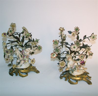 Lot 415 - Pair of Gilt-Bronze and Porcelain Ornaments...