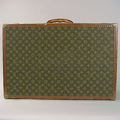Lot 599 - Louis Vuitton Suitcase 1950s Monogram canvas,...