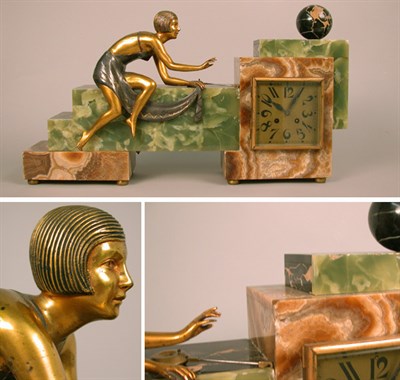 Lot 141 - Art Deco Gilt-Bronze and Onyx Mantel Clock The...