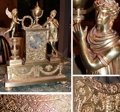 Lot 408A - Empire Style Gilt-Bronze Clock The dial set in...