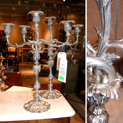 Lot 386 - Pair of Rococo Style Silver Plated Three-Light...