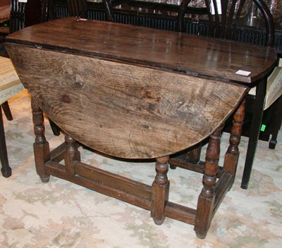 Lot 358 - Provincial George I Style Oak Gate-Leg Table