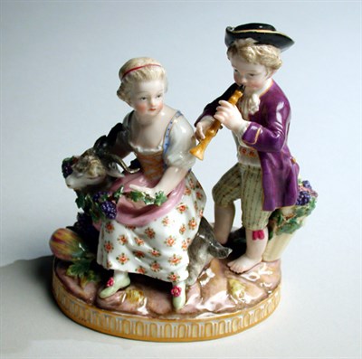 Lot 668 - Meissen Porcelain Figural Group Of a boy...