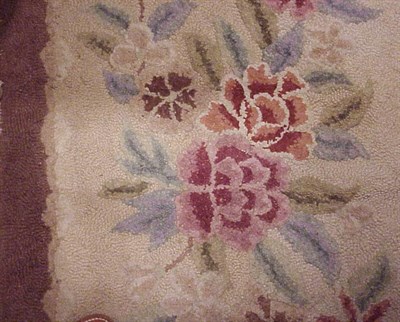 Lot 792 - Hooked Rug China, mid 20th century The buff...