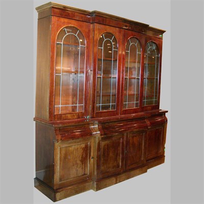 Lot 580 - Charles X Style Mahogany Breakfront Bookcase...