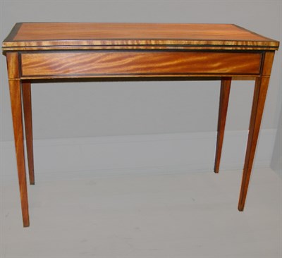 Lot 555 - George III Mahogany and Satinwood Games Table