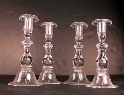 Lot 218 - Set of Four Steuben Glass Candlesticks Each...