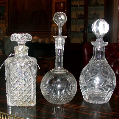 Lot 303 - Group of Three Colorless Cut Glass Decanters
