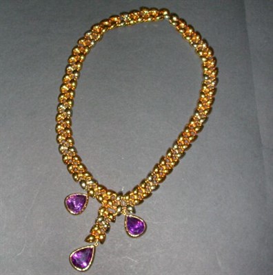 Lot 446 - Gold and Amethyst Necklace 18 kt. yellow and...