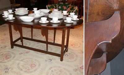 Lot 218 - Provincial Georgian Style Elm Drop Leaf Dining...