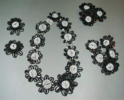 Lot 400 - Miriam Haskell Black and White Flower Suite...