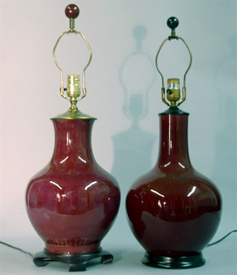 Lot 714 - Two Chinese Pottery Oxblood Lamps