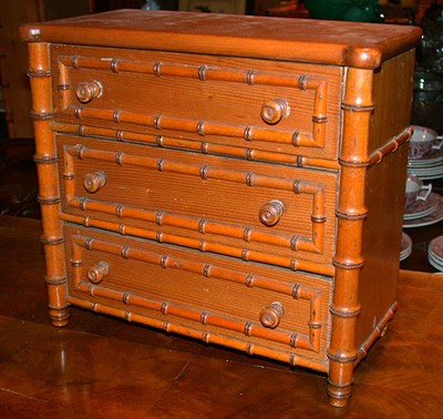 Lot 446 - Victorian Faux Bamboo Pine Miniature Chest of...
