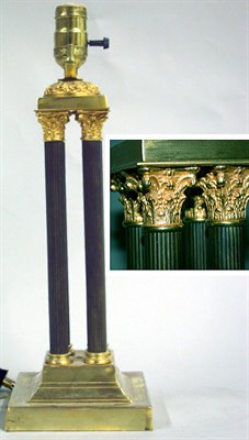 Lot 627 - Empire Style Brass Lamp The standard composed...