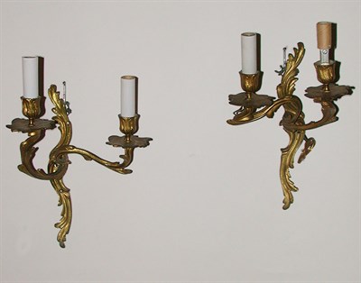 Lot 170 - Pair of Louis XV Gilt-Bronze Two-Light Sconces...