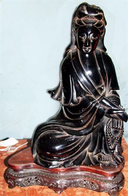 Lot 115 - Chinese Red Composition Figure of Guanyin...