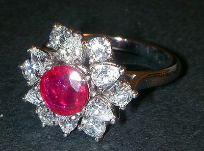 Lot 300 - Ruby and Diamond Cluster Ring Platinum, set to...
