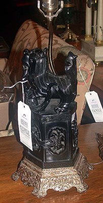 Lot 474 - Red Amber Fu Dog Mounted as a lamp.