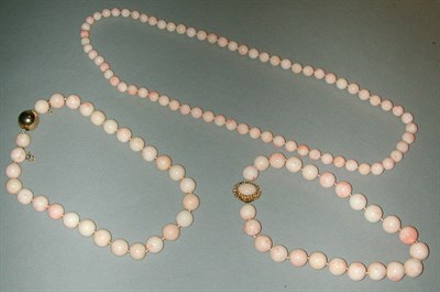 Lot 418 - Three Strands Coral Bead Necklaces Each white...