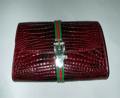 Lot 304 - Gucci Wine Red Crocodile Clutch 1970s...