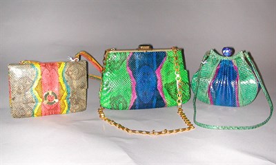 Lot 302 - Three Colorful Snakeskin Handbags The first...