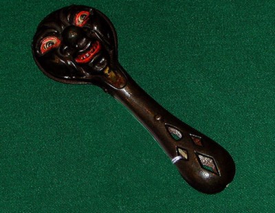 Lot 205 - Painted Cast Iron Cap Toy In the form of a man'...