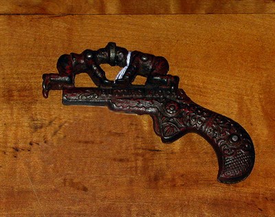 Lot 204 - Painted Cast Iron Cap Gun In the form of a gun...