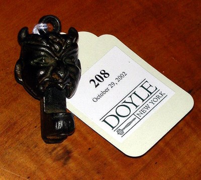 Lot 208 - Cast Iron Devil's Head Cap Bomb Marked...