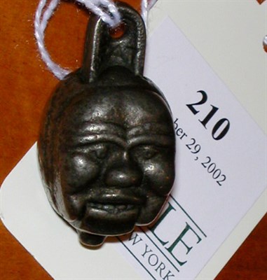Lot 210 - Cast Iron 'Chinese Man' Cap Bomb Ives,...