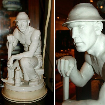 Lot 618 - Continental Porcelain Figure of a Miner...
