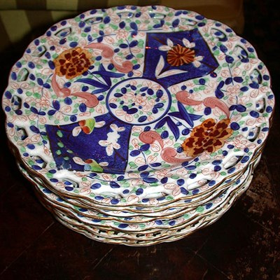 Lot 703 - Set of Nine Gilt Decorated Reticulated...