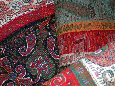 Lot 514 - Kashmir Shawl Indian, 1860s Woven in muted...