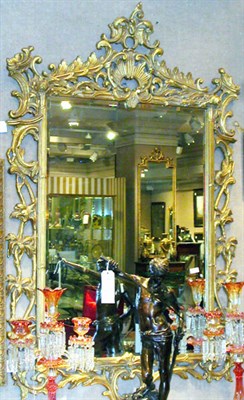 Lot 663 - Pair of Rococo Style Gilt Carved Wood Mirrors...