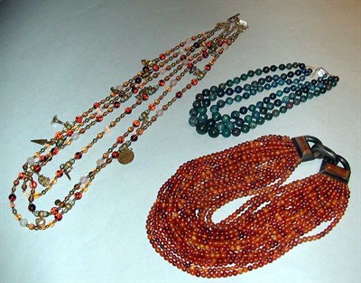 Lot 370 - Three Multistrand Bead Necklaces The first...