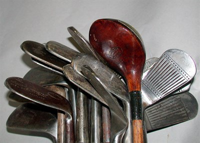 Lot 411 - A set of seven Rigden clubs, including a...