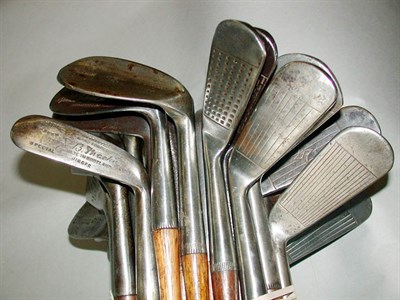 Lot 417 - A Tufts jigger with swastika stamp; and 29...