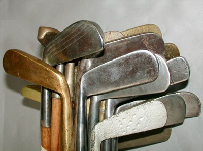 Lot 429 - Nine brass headed putters, including one steel...