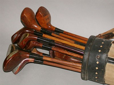 Lot 432 - Fifteen socket woods, including four brassies,...