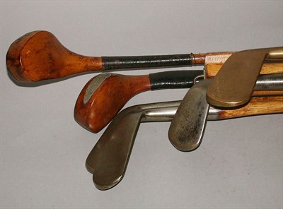 Lot 437 - A set of Victor clubs, comprising: a golden...