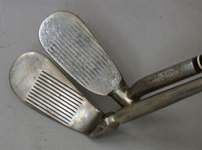 Lot 474 - A Novakclub adjustable iron with turn shaft...