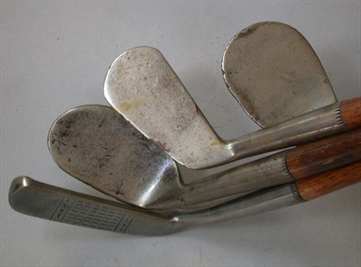 Lot 466 - A Gibson Smiths pattern anti-shank putter; and...