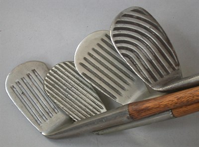 Lot 468 - A Kro-Flite waterfall niblick; a deep groove...