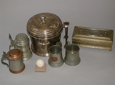 Lot 518 - An oblong embossed metal cigar box, the cover...