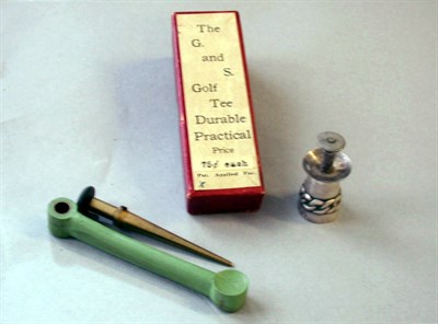 Lot 494 - A white metal sand tee mould with decorated...