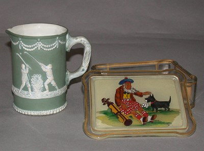 Lot 525 - A German green porcelain milk jug with golfing...