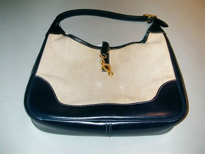 Lot 317 - Hermes Trim Bag Toile with navy trim, short...