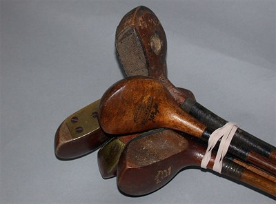 Lot 30 - A Gibson persimmon head putter with heavy...