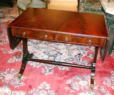 Lot 308 - Regency Style Mahogany Sofa Table With fold...