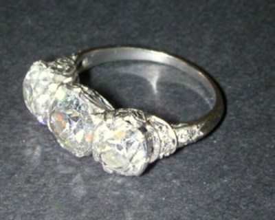 Lot 436 - Three Stone Diamond Ring Platinum, set to the...